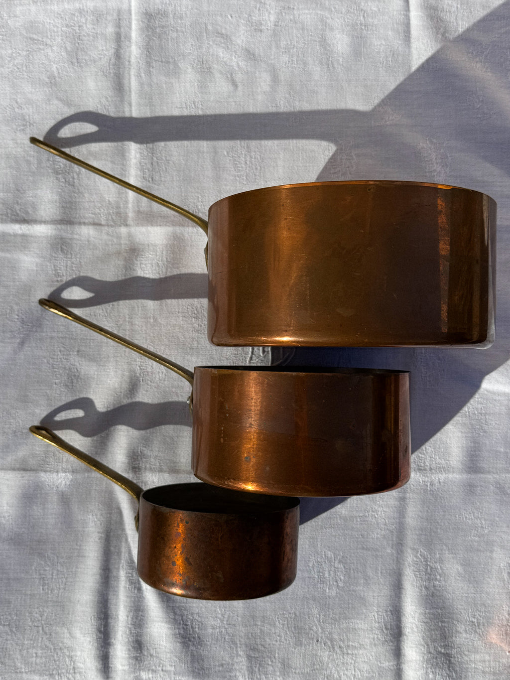 Sada 3 starožitných měděných rendlíků